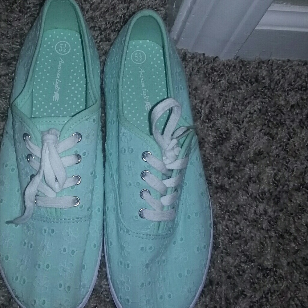 Light green color shoes .